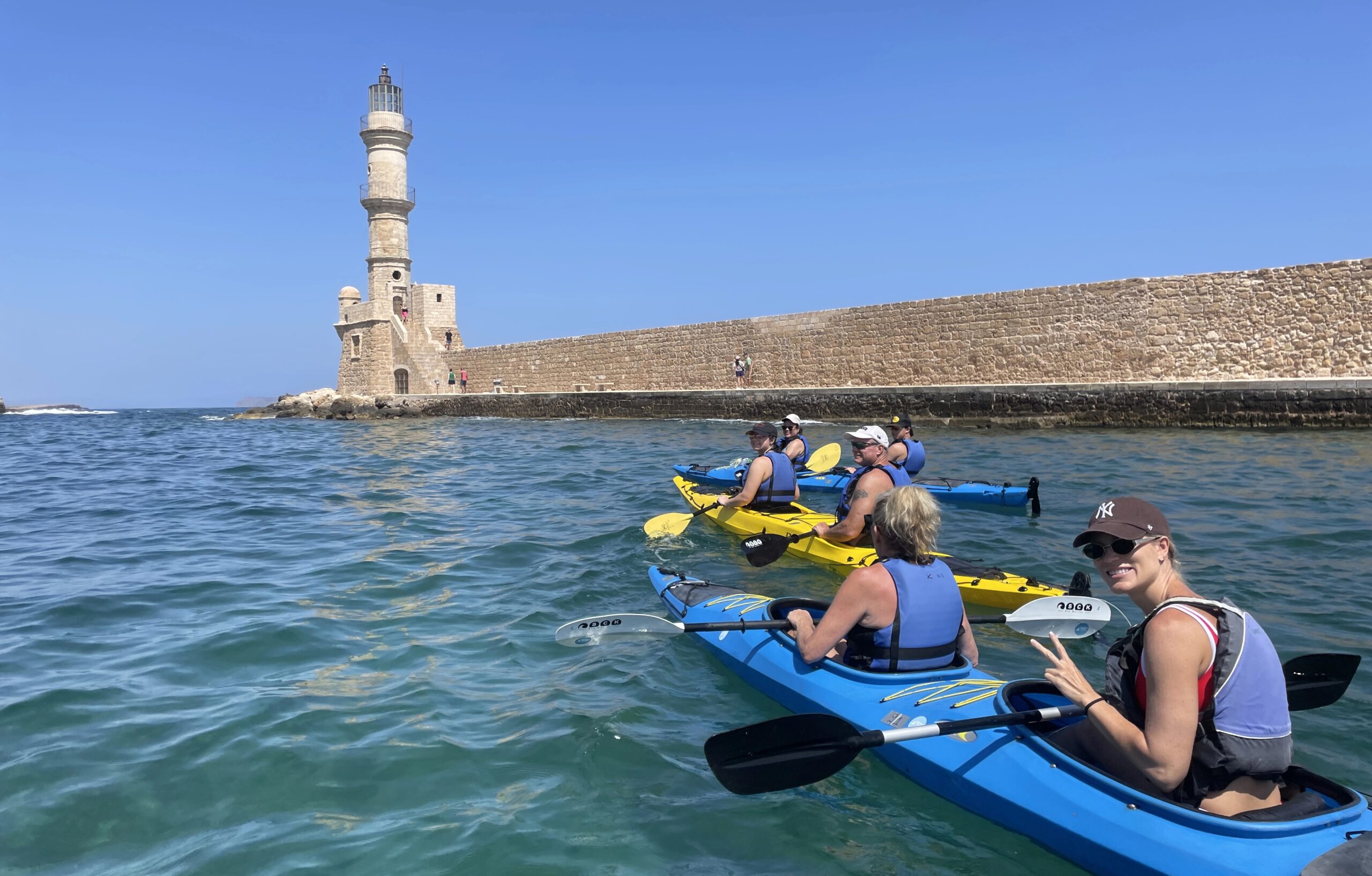 Beginner sea kayaking tour in Chania with calm waters and coastal views"